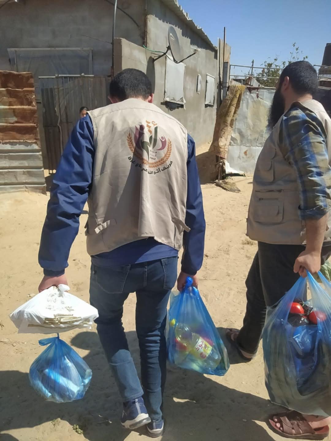 Volunteers delivering psychosocial support and counseling to families affected by trauma in Gaza
